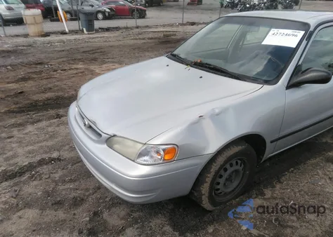 2000 Toyota Corolla Ce из США, поврежденный, VIN 2T1BR12E0YC321485